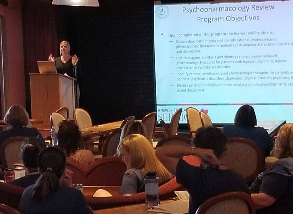 Dr. Shlosser at the Podium presenting the CE